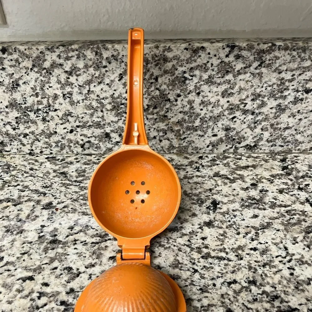 Well-Loved Hand Held Orange Squeezer